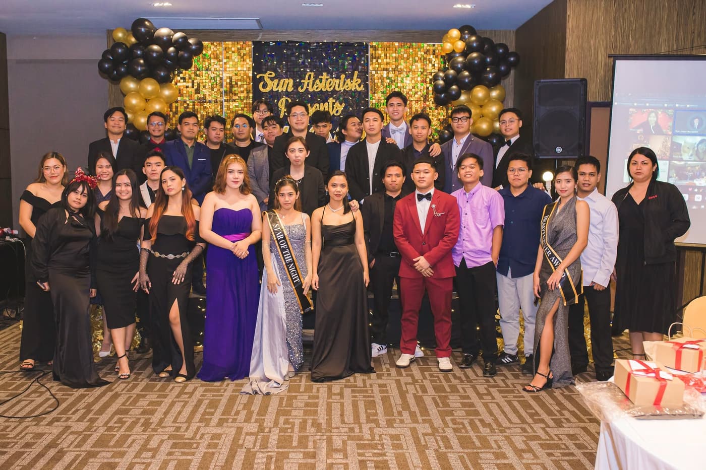 The team dressed up together on stage at the Sun* awards night.